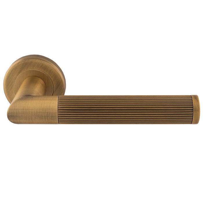 The Trend Lines Antique Brass Lever in Antique Brass